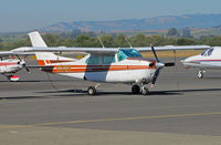 N761WH @ KAPC - TriWings Inc. (Reno, NV) 1978 Cessna T210M visiting @ Napa County Airport, CA (still with two different sized registrations but sans cockpit cover in this shot) - by Steve Nation