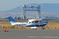 N2059U @ KAPC - 2006 Cessna T206H taxiing with Napa River RR Bridge in background @ Napa County Airport, CA - by Steve Nation