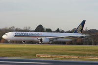 9V-SWH @ EGCC - Singapore Airlines B777 waiting for clearance to enter RW05L - by Chris Hall