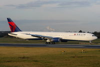 N827MH @ EGCC - Delta B767 turning off RW05R - by Chris Hall