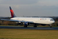 N827MH @ EGCC - Delta B767 just landed on RW05R - by Chris Hall