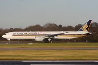 9V-SWH @ EGCC - Singapore Airlines B777 taxing to RW05L - by Chris Hall
