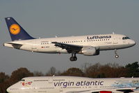 D-AILD @ EGCC - Lufthansa A319 arriving on RW05L - by Chris Hall