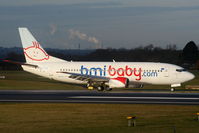 G-TOYM @ EGCC - BMI Baby B737 turning off RW05R - by Chris Hall