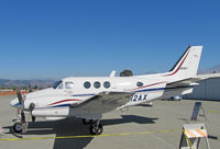 N12AX @ KWVI - 1978 Beech E-90 King Air in clutter @ 2010 Watsonville, CA Fly-in - by Steve Nation