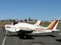 N6415J @ RAL - AIA ship covered up, tied down and parked by Admin Building - by Helicopterfriend