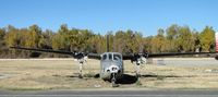 N27GA @ AJO - Stripped down and parked in the grass near the runway - by Helicopterfriend