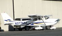 N377MM @ CNO - Parked by hanger - by Helicopterfriend