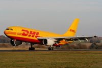 EI-OZH @ EGGW - DHL A300 touching down on RW26 - by Chris Hall