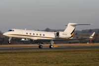 N516GH @ EGGW - Gulfstream V touching down on RW26 - by Chris Hall