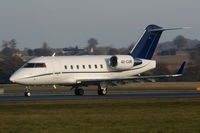 4X-CUR @ EGGW - Ray Aviation Challenger 604 touching down on RW26 - by Chris Hall