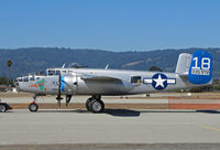 N125AZ @ KWVI - Commemorative Air Force Arizona Wing TB-25N 43-35972 blue tail #18 'Maid in the Shade' nose art being towed @ 2010 Watsonville Fly-in - by Steve Nation