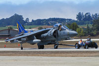 165006 @ KWVI - VMA-513 Nightmares AV-8B(+) WF-01 with blue & gold tail being towed to military ramp by the jet tug @ 2010 Watsonville Fly-in - by Steve Nation