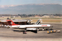 HB-IVD @ GVA - Fokker 100 of Swissair at the terminal at Geneva in March 1993. - by Peter Nicholson