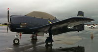 N5015L @ KSNA - Spotted on the East Side ramp at KSNA on a rainy day.  Stunning restoration work which looks almost brand new.