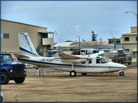 J8-KIM @ TJSJ - Mustique Airways Rockwell 500S Shrike Commander J8-KIM (cn 3253) - by Tomás Del Coro