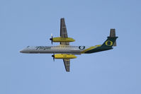 N407QX @ KSEA - Seen in the colors of the University of Oregon Ducks is this Horizon Air Q400. Aircraft replaces the CRJ that was in the same scheme. - by Joe G. Walker
