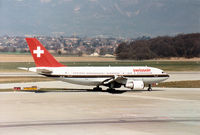 HB-IPI @ GVA - Airbus A310-322 of Swissair taxying to the active runwayat Geneva in March 1993. - by Peter Nicholson