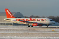 G-EZBY @ EGCC - easyJet A319 departing from RW05L - by Chris Hall