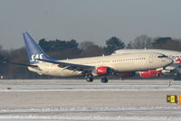 LN-RRU @ EGCC - Scandinavian B737 landing on RW05L - by Chris Hall