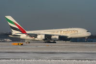 A6-EDG @ EGCC - Emirates A380 landing on RW05L - by Chris Hall
