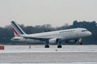 F-GKXZ @ EGCC - Air France A320 landing on RW05L - by Chris Hall