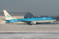 PH-BXH @ EGCC - KLM B737 landing on RW05L - by Chris Hall
