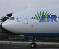 F-OONE @ TNCM - Air Caraibes back tracking the active for parking at TNCM - by Daniel Jef