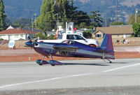 N540WS @ KWVI - Bill Stein Aerosports 2002 EDGE 540 with Unison and Zulu titles taxiing  at 2010 Watsonville Fly-In - note mobile air traffic control tower in background - by Steve Nation