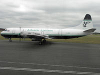 G-LOFE @ EGBE - Electras are Fantastic Aircraft, taken through the window of DC-6 G-APSA - by Manxman