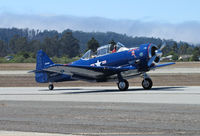 N2832V @ KWVI - North American AT-6G in dark blue colors with USMC titles and Anytime II nose art taxiing @ 2010 Watsonville Fly-In - by Steve Nation