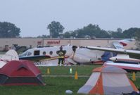 N6JR @ KOSH - EAA AirVenture 2010. I didn't see the crash, but I found the aftermath about 20 minutes later complete with a huge group of people gathered around.