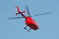 G-TVAM @ EGFH - Bond Air Services air ambulance helicopter over the airport. - by Roger Winser