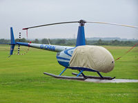 G-CFAN @ EGCB - R44 G-CFAN. Poor weather resulted in poor photos, not only that but nothing was moving - by Manxman