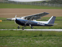 G-RABA @ EGNS - Cessna 172 G-RABA touches down - by Manxman