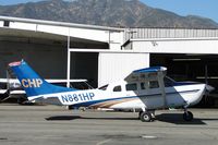 N881HP @ CCB - Parked at Foothill Sales & Service as N811HP Eurocopter arrives to pick up pilot, has new American flag on the top of the tail - by Helicopterfriend