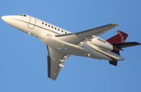 N88HE @ KLAX - CAESARS ENTERTAINMENT OPERATING CO.,FALCON 2000EX departing 25R KLAX, en-route to KLAS. - by Mark Kalfas