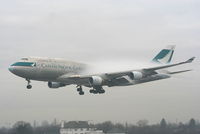 B-HKJ @ EGCC - Cathay Pacific Cargo B747 coming through the fog on approach to RW23R - by Chris Hall