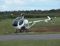 G-FCBI @ EGHH - Schweizer 269 outside the Flying Club - by BIKE PILOT