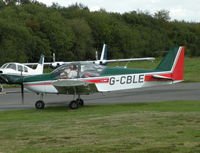G-CBLE @ EGHH - Taxying past the Flying Club - by BIKE PILOT