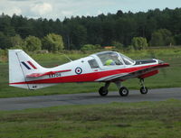 G-BCUV @ EGHH - Bulldog taxying past the Club house - by BIKE PILOT