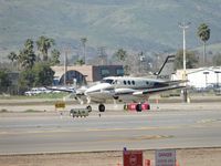 N4216S @ SEE - Taxiing eastbound after landing on runway 27 - by Helicopterfriend