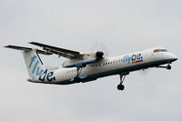 G-ECOR @ EGCC - Flybe Dash-8 on approach for RW05L - by Chris Hall