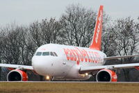 G-EZFG @ EGCC - Easyjet A319 on hold for RW05L - by Chris Hall