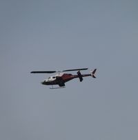 N587MG @ CNO - Crossing over the airport, heading northbound - by Helicopterfriend