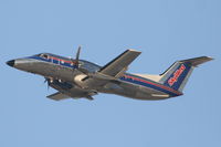 N561SW @ KLAX - SkyWest/United Express Embraer EMB-120, SKW6475 departing 25R KLAX enroute to KNYL/Yuma. - by Mark Kalfas