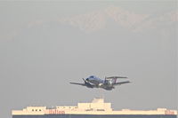 N561SW @ KLAX - SkyWest/United Express Embraer EMB-120, SKW6475 departing 25R KLAX enroute to KNYL/Yuma. - by Mark Kalfas