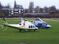 G-FUFU @ EGCB - Air Harrods A109 with G-ETOU behind it - by Chris Hall