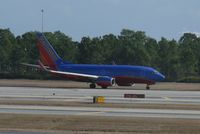 N745SW @ KMCO - Southwest Airlines Boeing 737-700 - by Kreg Anderson