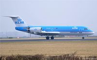 PH-KZA @ EHAM - Landing on the Polderbaan - by Jan Lefers